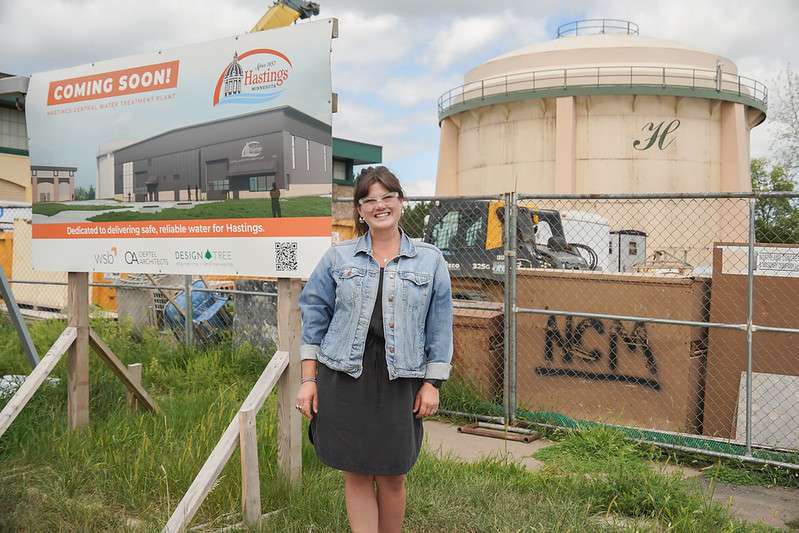 Jen Fox, the DFL candidate for Minnesota House district 41B, is standing in front of a developing water treatment plant in Hastings, MN.