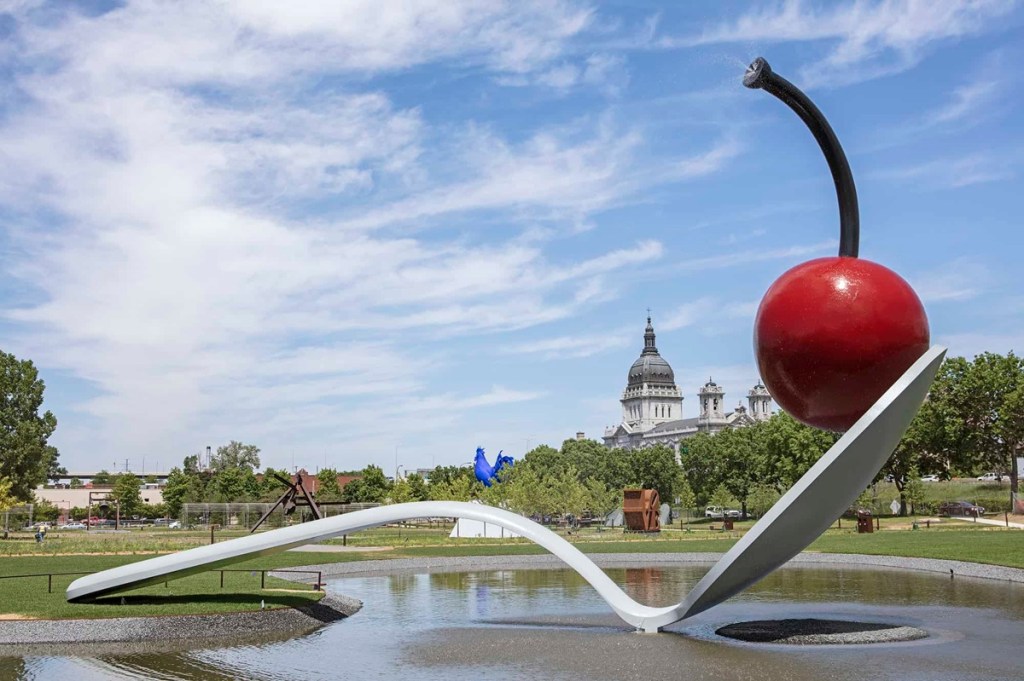 A huge cherry on a gigantic spoon, one of many roadside attractions in Minnesota