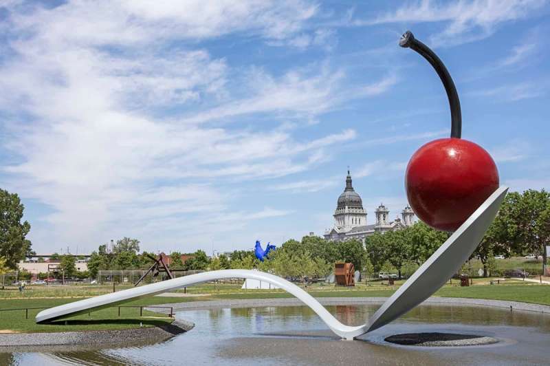 A huge cherry on a gigantic spoon, one of many roadside attractions in Minnesota
